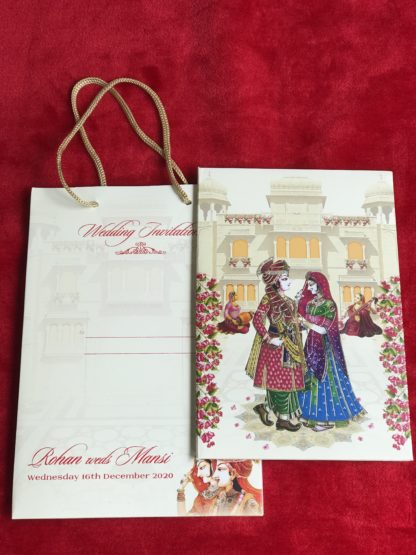 Traditional wedding cards with dulha and dulhan (groom and bride)