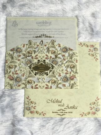 Laser cut wedding card with floral design and acrylic name plate