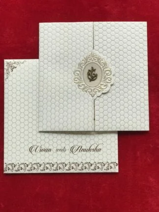 White laser cut wedding card in 3 fold pattern