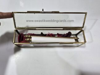 Premium glass box scroll invitation card with scroll and artificial flower petals.