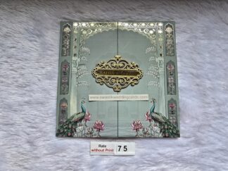 Hardbound wedding invitation card with peacock print and door style opening along with Box cover and 2 inserts.