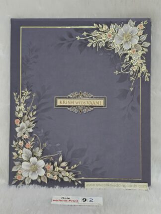 Hardbound floral design wedding invitation card with gold UV foil and velvet lamination on card and wooden name plate.