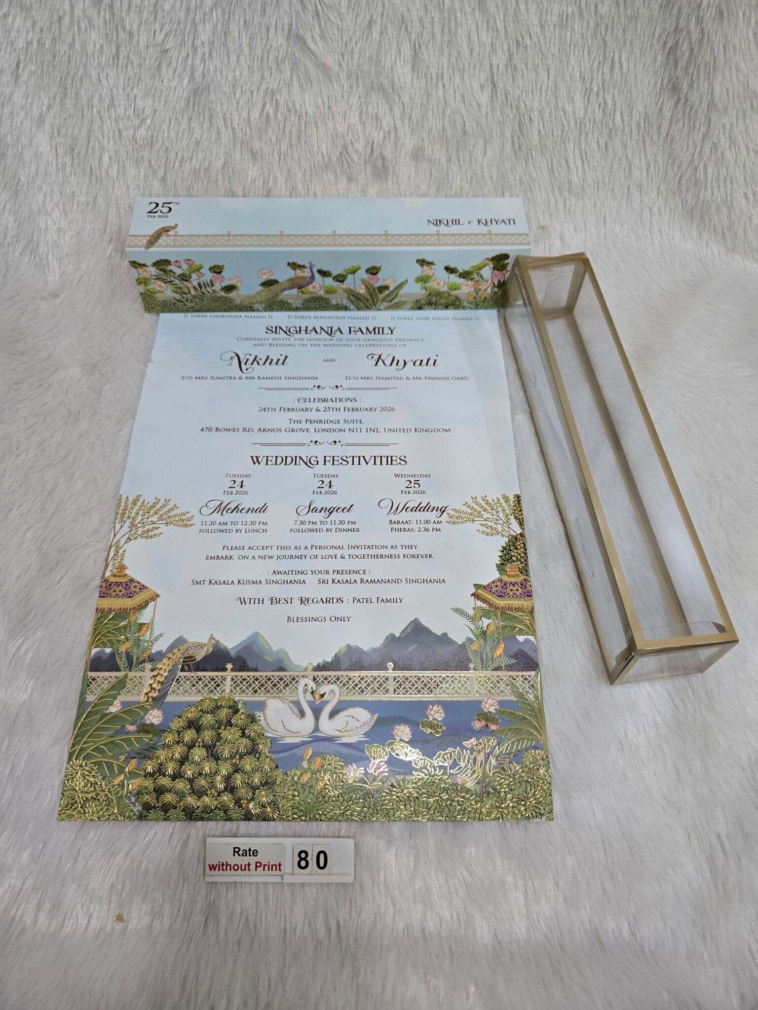 Plastic cube box with slider cover and paper scroll with design and ...