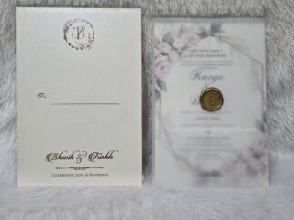 Butter(Transparent) paper wedding invitation card with plastic seal and digital inserts and a mettalic card box cover.